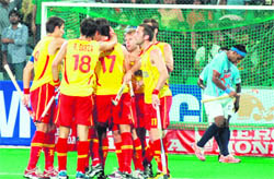 Spains players celebrate a goal in New Delhi 