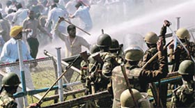 The police uses water cannons on supporters of the HJC during a protest in Chandigarh on Friday.