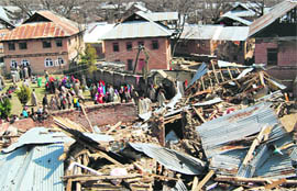 The debris of houses destroyed in an encounter between militants and security forces in the Dadasara area of Pulwama district which ended on Thursday.