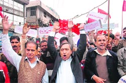 CITU president MY Tarigami, along with other union leaders, at a protest against price rise at Indira Chowk in Jammu on Saturday.