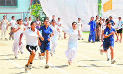 Students take part in the 100m-race during annual athletics meet in Ludhiana 