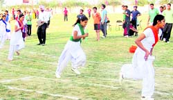 Students take part in a race during an athletics meet at Bhutta College of Education near Ahmedgarh