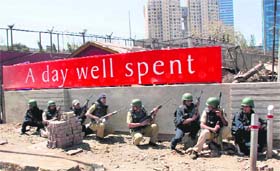 Black commandos and Mumbai police personnel during a mock drill at High Street Phoenix Mall in Mumbai on Sunday
