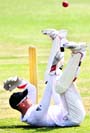 Englands Matt Prior falls during a three-day cricket match against Bangladesh A Team in Chittagong on Sunday