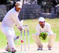 A match in progress at the Jitender Anand Memorial Cricket Tournament in Dehradun on Monday
