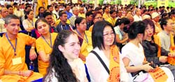 Foreign delegates at the inauguration of the International Yoga Festival in Dev Sanskriti University in Haridwar on Monday