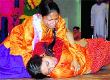A skit on womens plight being staged at the Raj Bhawan in Dehradun on Monday