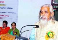 Dr SN Mishra, convener, SASA, addresses a gathering in Dehradun on Monday
