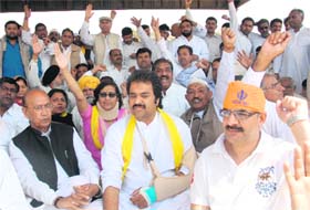 HJC president Kuldeep Bishnoi (centre) with his partymen in Chandigarh