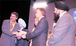 Prof Davinder Parkash (left) of Haryana College of Technology and Management, Kaithal, being awarded Young Scientist Award by Punjab Governor and UT Administrator Shiv Raj Patil at the 13th Punjab Science Congress held at Panjab University in Chandigarh recently