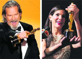 (Left) Jeff Bridges accepts the Oscar for best performance by an actor in a leading role for Crazy Heart and Sandra Bullock looks at her Oscar at the Governors Ball following the 82nd Academy Awards