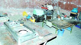 A gas burner and heater damage the walls of the Baradari heritage building at Ram Bagh in Amritsar.