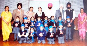 Students of Sri Guru Harkrishan Senior Secondary Public School pose with their trophies after the prize distribution function in Amritsar.