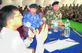 Mela police veterans share their Kumbh experience with CRPF-RAF personnel in Haridwar. 