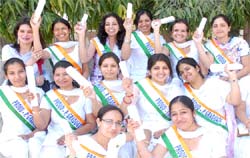Students of Kamla Nehru College for Women, Phagwara, are all smiles after receiving degrees.