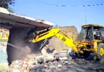 A shop within the Payal Fort being demolished by the administration on Tuesday