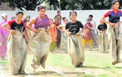 Participants take part in sack race during the annual sports meet at the Government Polytechnic College for Women, Sector 10, Chandigarh, on Wednesday. 
