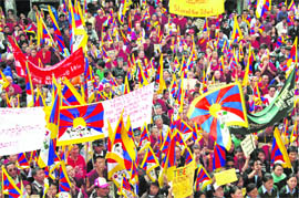 Tibetans hold a rally on the 51st anniversary of the Tibetan National Uprising Day at McLeodganj near Dharamsala on Wednesday. 