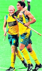 Australias Robert Hammond (L) and Desmond Abbott 