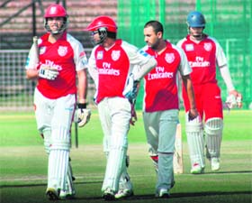 THE SUPER FOUR: Kings XI Punjab players Yuvraj Singh, skipper Kumar Sangakkara, Ravi Bopara and Reetinder Sodhi after a practice session at the PCA stadium