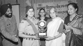 Health minister Laxmi Kant Chawla (second from right) honours NCC cadet at Government College, Ropar