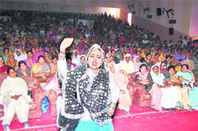 A student performs a Haryanvi dance on the occasion of the International Womens Day in Sirsa