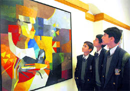 Students enjoying colours at a painting exhibition at Gaiety Theatre in Shimla on Thursday.