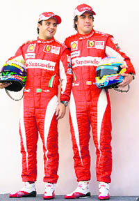 Ferrari F1 drivers Felipe Massa (L) and Fernando Alonso pose for photographers at the Bahrain F1 Grand Prix at Sakhir circuit in Manama on Thursday.