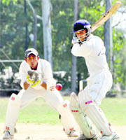 A batsman readies to play a shot at the Jitendra Anand Memorial Cricket Tournament in Dehradun on Friday.