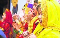 Tiny tots of Lovedale Montessori perform during their annual day function in Ludhiana on Friday.