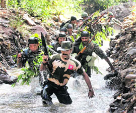 Madhya Pradesh Special Task Force and Anti Terrorist Squad teams during special commando training in the jungles of Kerva in Bhopal