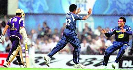 Deccan Chargers players celebrate the wicket of Sourav Ganguly on Friday.  PTI
