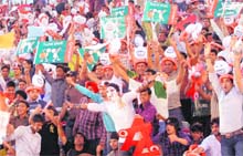 Youngsters in a joyous mood during the IPL match at the PCA stadium in Mohali on Saturday. 