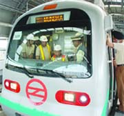 Delhi Metro MD E. Sreedharan inspects the first standard gauge line of India in New Delhi on Saturday