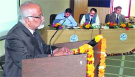 Prof PK Hajra addresses a seminar on biodiversity at Doon University on Saturday.