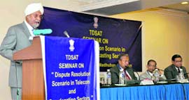 Chief Justice JS Khehar addresses a seminar in Dehradun on Saturday.