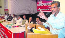 Samar Bhandari, a senior CPI leader, speaks at a convention of the Uttarakhand statehood agitators in Dehradun on Saturday.