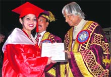 Former President APJ Abdul Kalam presents a degree to a student at the NDRI convocation in Karnal on Saturday