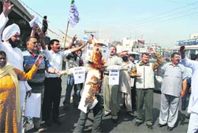 Members of the Panthers Party protest against the PDP for introducing the Permanent Resident Women Disqualification Bill in the Legislative Council, in Jammu