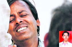 The father of Rajinder Verma (inset) mourns his sons death. Tribune photos: Himanshu Mahajan