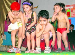 Tiny tots of Maple Bear Play Way perform during the annual day function of their school in Ludhiana on Saturday. A Tribune photograph