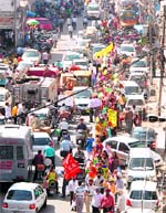 Traffic went awry after LIC employees formed a human chain during a protest in Ludhiana on Saturday. Tribune photo: Himanshu Majahan