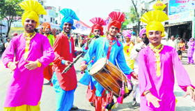 Bhangra dancers perform as part of Nirmal Akhadas Peshwayi in Haridwar on Sunday.