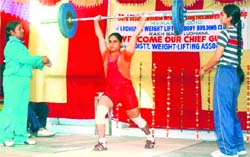 A lifter in action during the 33rd Ludhiana District Weightlifting Championship on Sunday. Photo: Inderjeet Verma