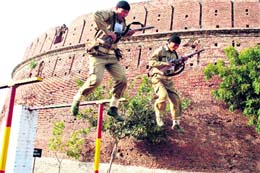 Cops undergo training at the Commando Training Centre, Bahadurgarh, in Patiala. DGP Paramdeep Singh Gill visited the training centre on Saturday evening. He reviewed the progress of the camp and witnessed drills. A Tribune photograph
