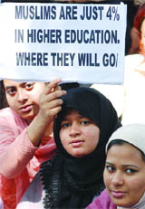 Students and teachers take part in a demonstration demanding 50 per cent reservation for Muslim students in Jamia Millia Islamia, New Delhi