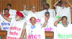 BJP MLAs protest against the government on price rise issue during L-G Tejendra Khannas (not in picture) speech at Old Secretariat in Delhi