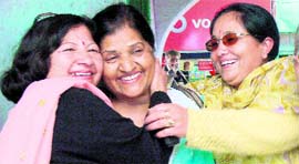 Vimla Kashyap (centre) of the BJP being greeted by her supporters after her party decided to field her for the lone Rajya Sabha seat.