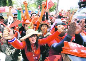 Supporters of ex-Prime Minister Thaksin Shinawatra gather for a protest outside the base of Thai Army 11th Infantry Regiment in Bangkok