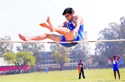 A participant in action during an athletics meet in Chandigarh on Tuesday. 
